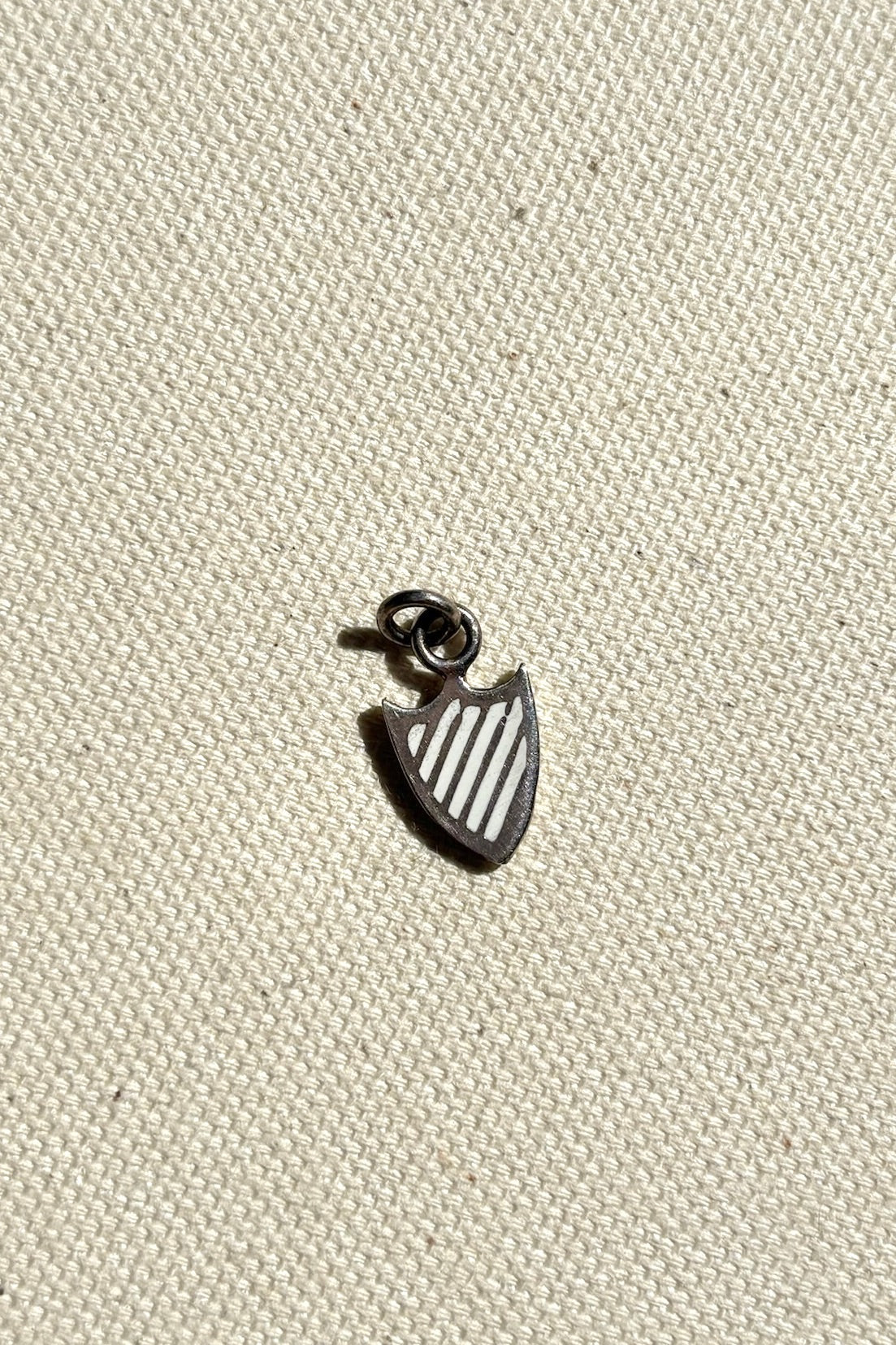 Strength Shield Charm / White/Silver