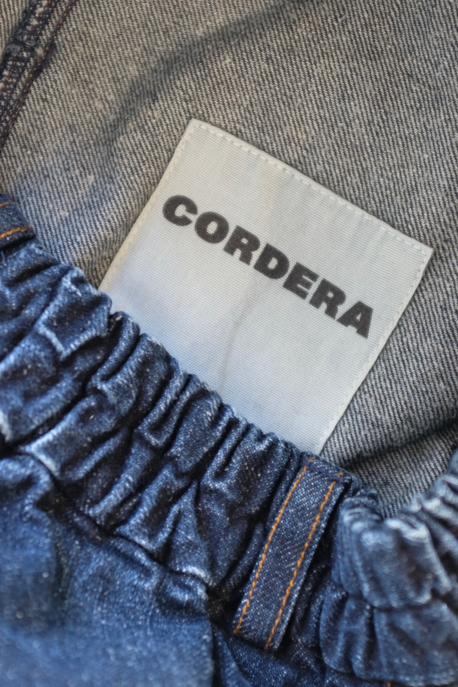 Pre-Loved / Cordera Curve Leg Denim / OS