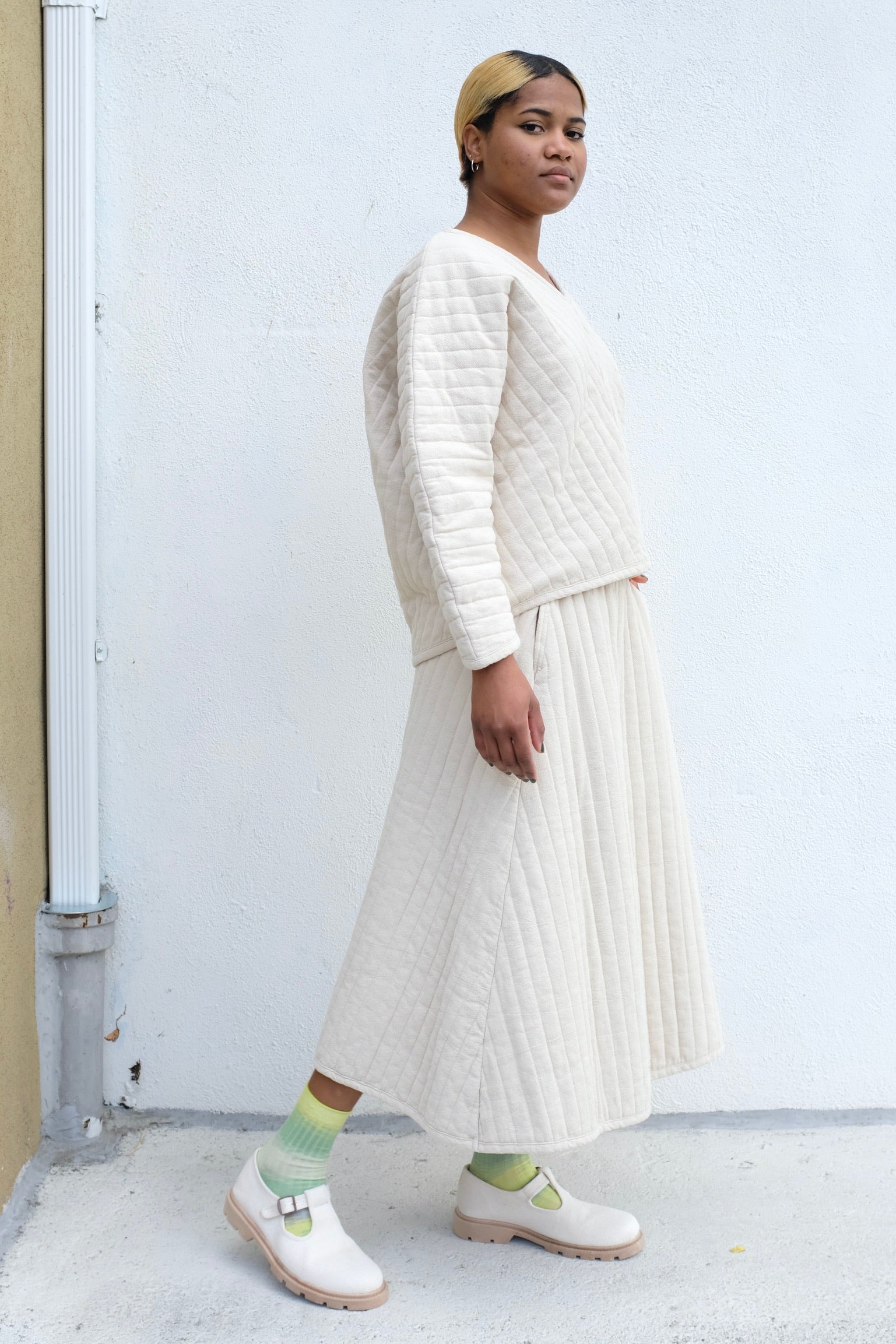 Black Crane Quilted V Neck Top / Ivory