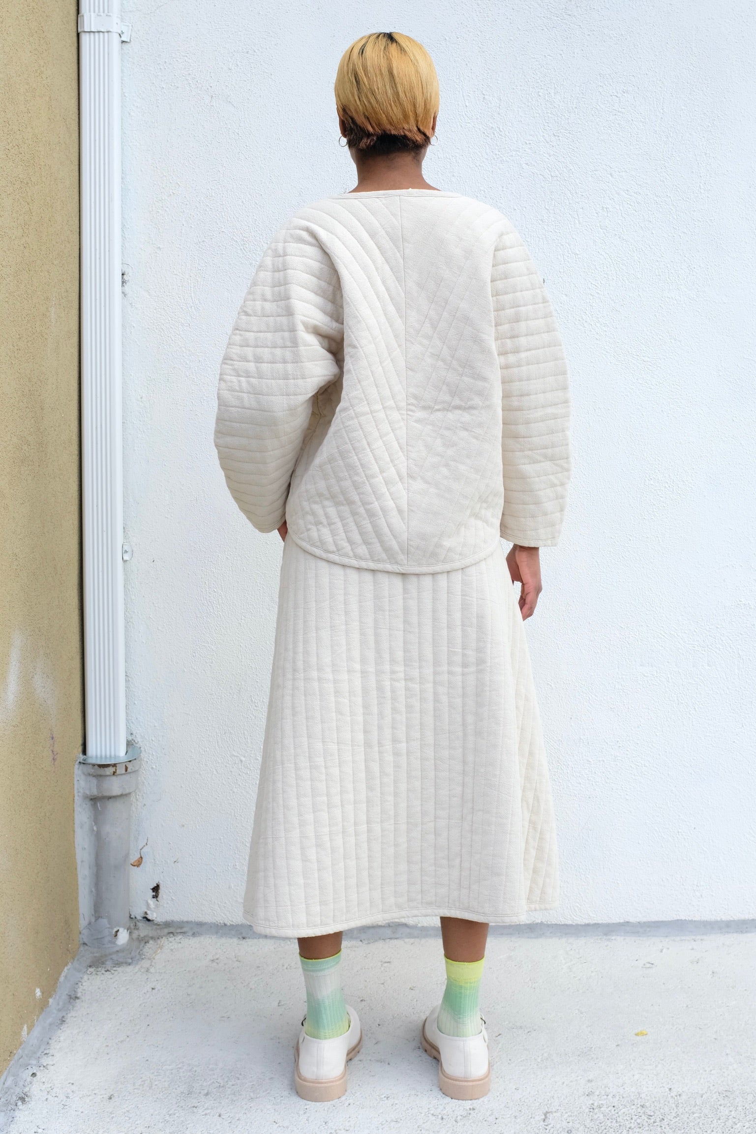 Black Crane Quilted V Neck Top / Ivory