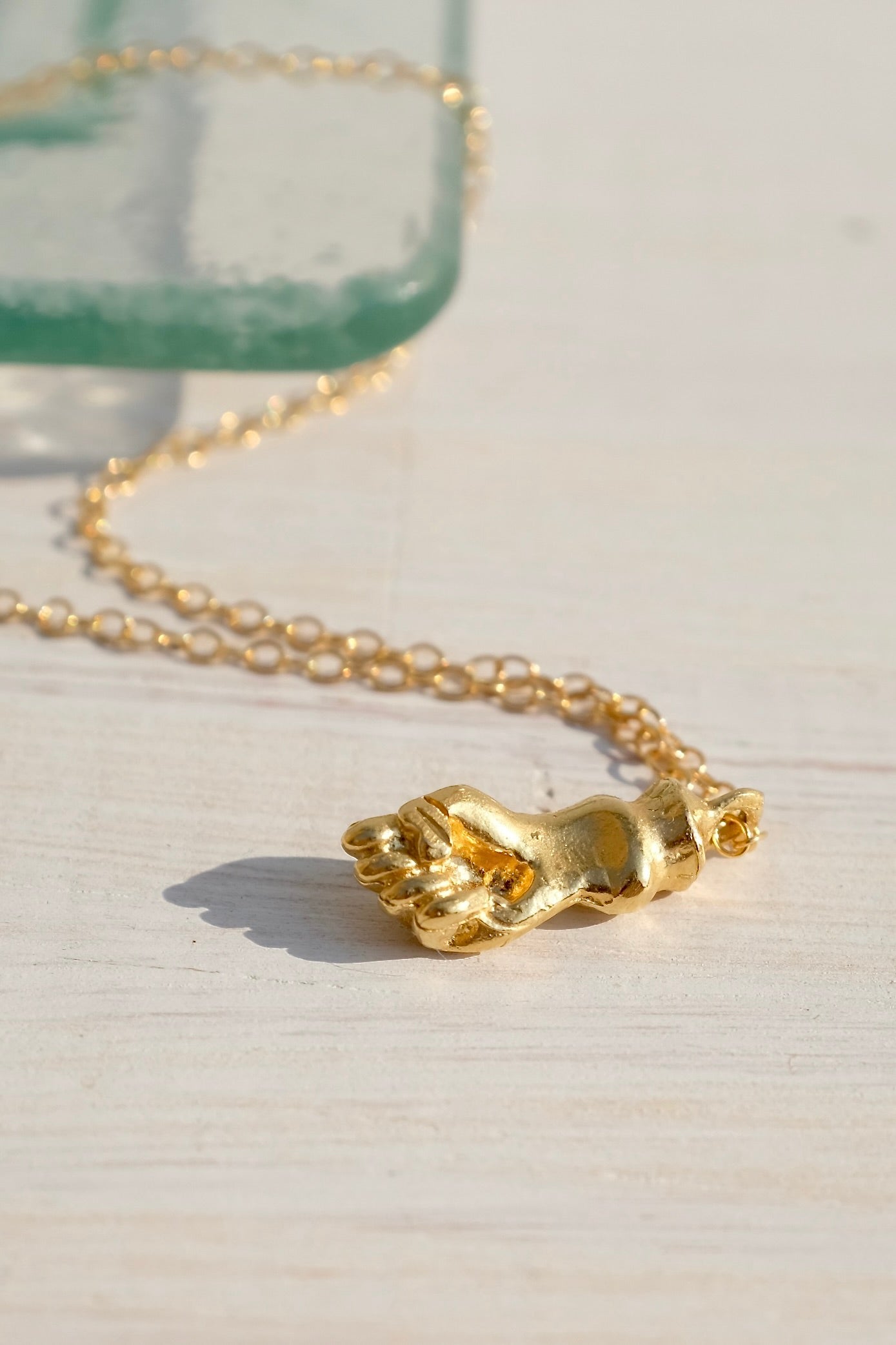 Mercurial Fist Necklace / Gold