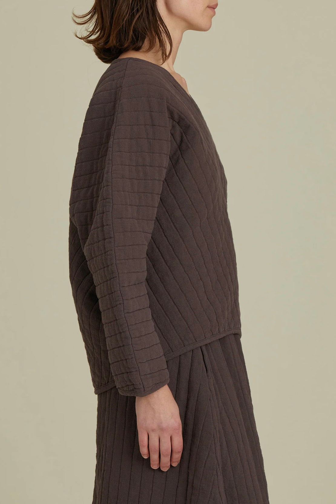 Black Crane Quilted V Neck Top / Plum