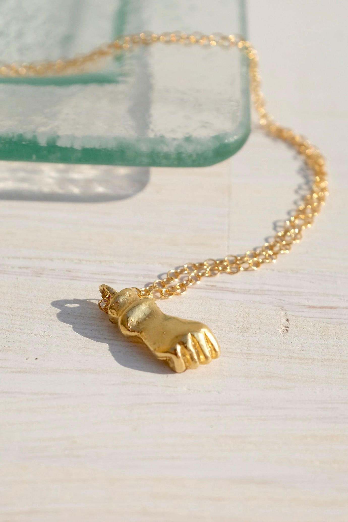 Mercurial Fist Necklace / Gold